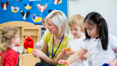 Teacher with young students
