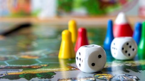 board game with dice and figures