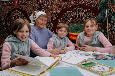 Family studying in mother tongue