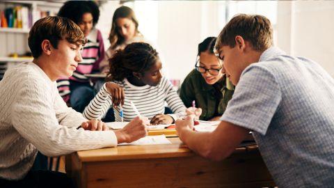 Students studying at a table
