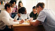 Students studying at a table