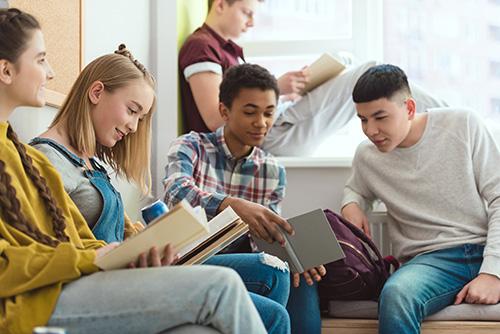 Teenagers reading